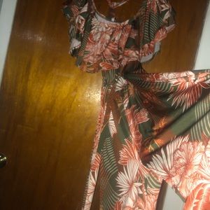 Off the shoulder, floral patterned jump suit.